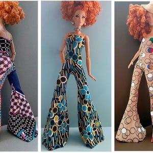 May include: Three dolls wearing colorful, patterned jumpsuits with flared legs. The jumpsuits feature geometric, floral, and abstract designs in various colors. Each doll has red curly hair and is posed against a plain background.
