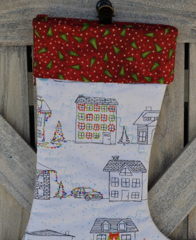Snowy Houses with decorations Stocking