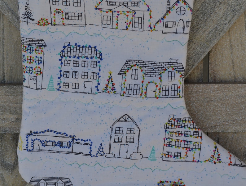 Snowy Houses with decorations Stocking
