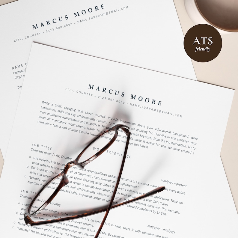 May include: A close-up of a resume template with the text "MARCUS MOORE" at the top. The template includes sections for job title, work experience, and education. A pair of eyeglasses is partially visible in the foreground.