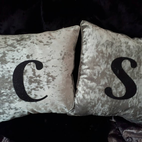 Initial cushions top