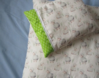Doll bed Doll bed linen with filling - with lots of sheep on a beige background and a few flowers