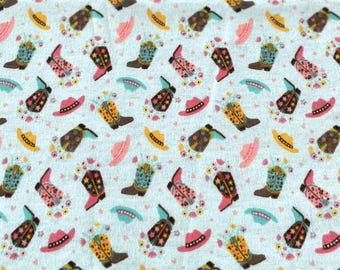 PER YARD ~ Camelot Cowgirl Hats and Boots on Teal flannel fabric ~ 100% cotton