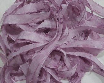 Hand-dyed Ribbon (Mulberry) by Vintage NeedleArts 3 continuous yards 1/2" rayon trim primitive distressed purple on a lighter background