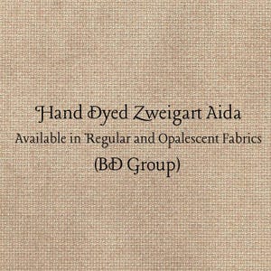 May include: A tan, woven Aida fabric with a visible grid texture. The text printed on the fabric reads: Hand Dyed Zweigart Aida, Available in Regular and Opalescent Fabrics, (BD Group). The material has a consistent, neutral, light brown color.
