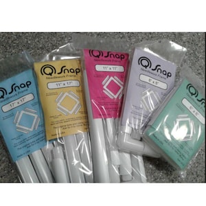May include: A collection of five Q-Snap needlework frames in various sizes, including 17" x 17", 11" x 17", 11" x 11", 8" x 8", and 6" x 6". Each frame is packaged in a clear plastic bag with a colored label displaying the brand name and dimensions.