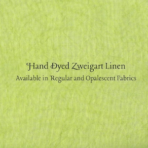 May include: Close-up of a textured, light green fabric. The text "Hand Dyed Zweigart Linen" is displayed in elegant script, with the words "Available in Regular and Opalecent Fabrics" below.