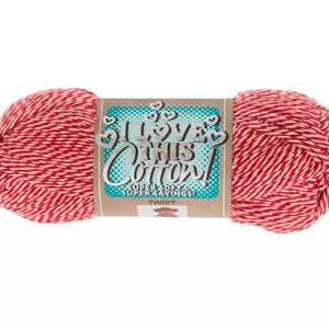 May include: A skein of red and white twisted cotton yarn with a central paper label featuring the text I LOVE THIS COTTON! SUPER SOFT & SUPER SAVINGS! TWIST and a small graphic of a sock monkey on a teal background with white hearts.