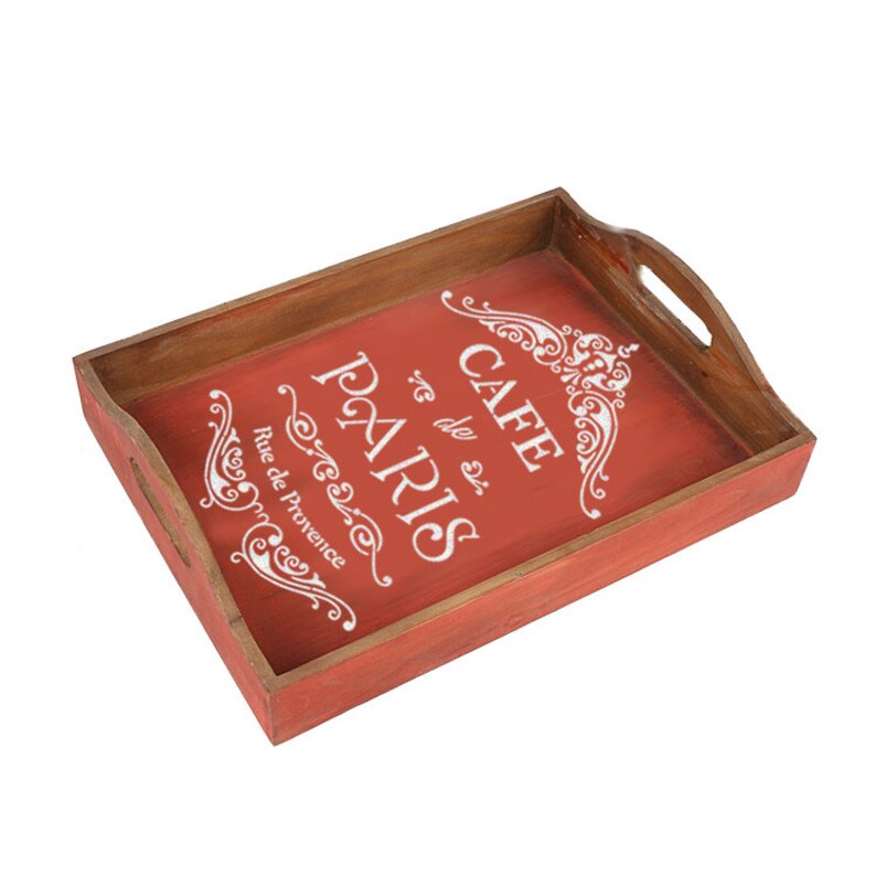 May include: Red wooden tray with a white design that says "Cafe de Paris" and "Rue de Provence".