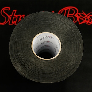 May include: A roll of black fabric tape with a white label that says "Strong Box" on it.