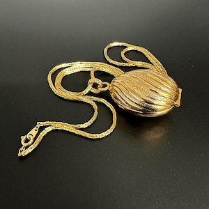 Collier pendentif médaillon bijoux vintage AVON, anciennement parfum crème à ouvrir et fermer, bijoux vintage années 1980 de haute qualité