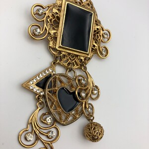 Broche pendentif strass vintage années 1980 émaillée noire et plaquée or, strass décorée, 10 cm de long, broche rare image 3