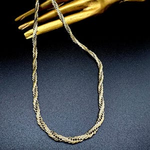 Pierre Lang necklace high quality designer PL signed gold-plated, braided design link chain