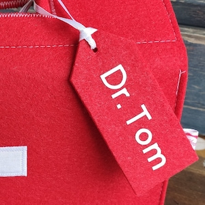 Arztkoffer Schild personalisiert