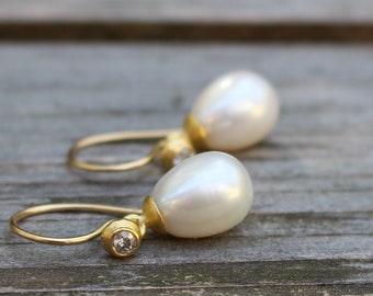 Sweetwater pearl earrings with diamonds  and yellow gold