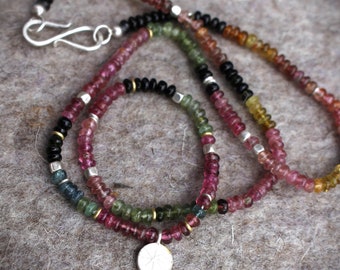 colorful tourmaline necklace with silver pendant and gold eyelets