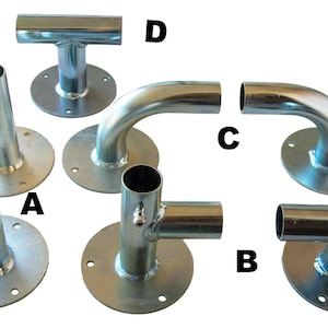 May include: Five metal pipe fittings with different configurations.  The fittings are all silver in color and have a round base.  The fittings are labeled A, B, C, and D.