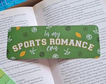 May include: A green bookmark with white and yellow sports icons and the text "In my Sports Romance era".