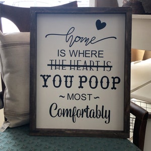 Home is where you poop most comfortably, bathroom humor, restroom sign, bathroom decor, wood framed sign