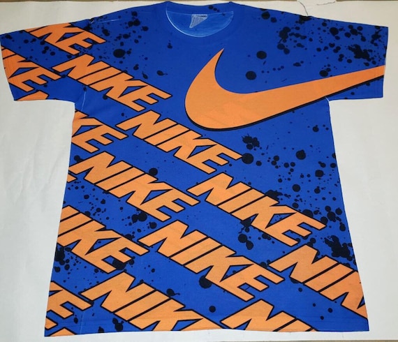royal blue and orange nike shirt