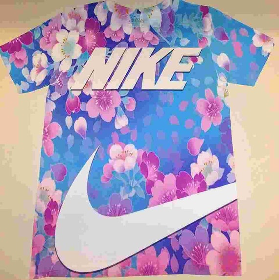 white pink and blue nike shirt