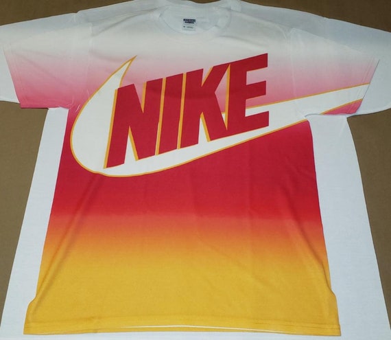 orange and pink nike shirt