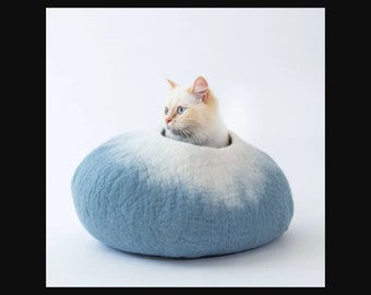 Handgemaakte vilten kattengrot: milieuvriendelijk bed van Nieuw-Zeelandse wol