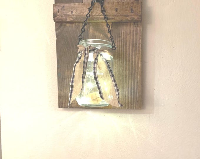 Shutter style sconces with mason jars