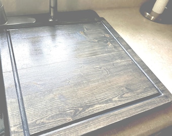 Kitchen sink cover for half of double sink with drip edge