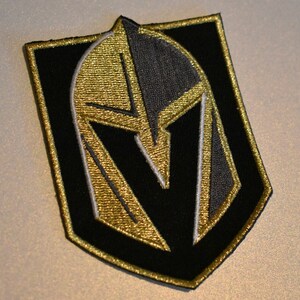 Patch de logotipo primário dourado metálico 3,75"