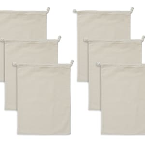 May include: Set of six natural-colored cotton drawstring bags. The bags are made of a soft, lightweight fabric and have a simple design.