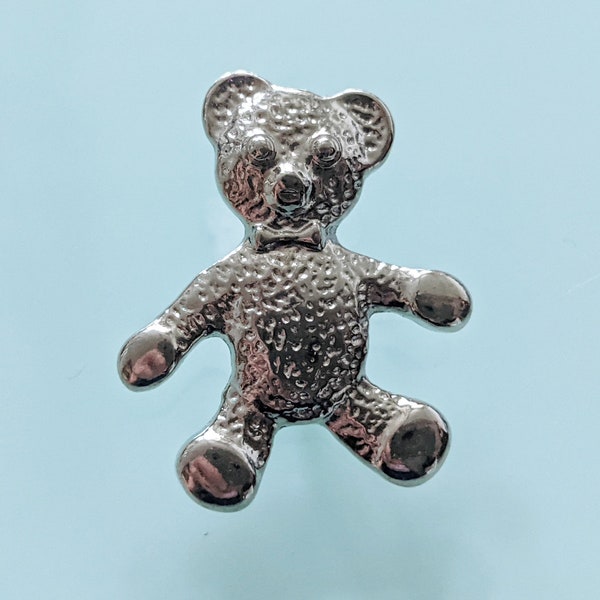 Bouton Teddy, ourson en métal avec oeillet hauteur 27 mm