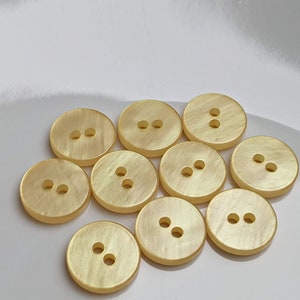 small, yellow plastic buttons to choose from 10 mm to 13 mm image 7