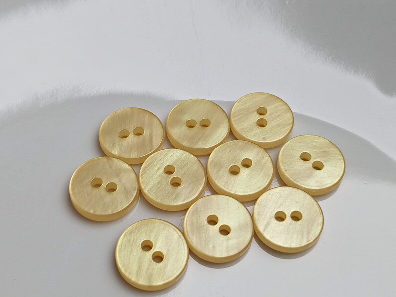 small, yellow plastic buttons to choose from 10 mm to 13 mm image 7