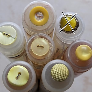 small, yellow plastic buttons to choose from 10 mm to 13 mm image 1