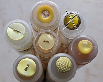 small, yellow plastic buttons - to choose from - 10 mm to 13 mm