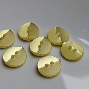 small, yellow plastic buttons to choose from 10 mm to 13 mm image 3