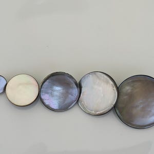 7 or more mother-of-pearl buttons with eyelet, light blue, grey-blue or purple - from 9 mm - Buttons
