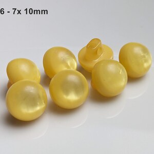 small, yellow plastic buttons to choose from 10 mm to 13 mm GK06 - 7x 10mm