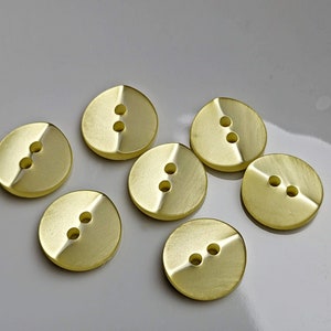 small, yellow plastic buttons to choose from 10 mm to 13 mm image 4