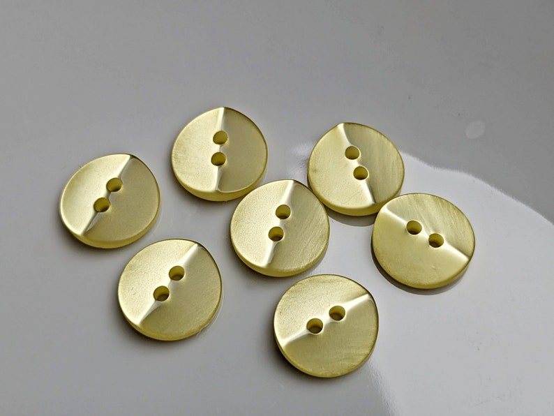 small, yellow plastic buttons to choose from 10 mm to 13 mm image 4