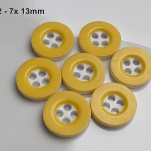 small, yellow plastic buttons to choose from 10 mm to 13 mm GK02 - 7x 13mm