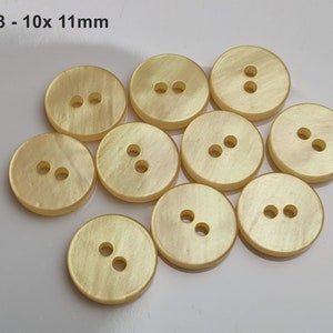 small, yellow plastic buttons to choose from 10 mm to 13 mm GK03 - 10x 11mm