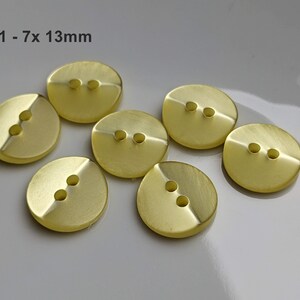 small, yellow plastic buttons to choose from 10 mm to 13 mm GK01 - 7x 13mm