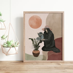 May include: A digital art print featuring a woman in a black robe and a wide-brimmed hat watering a potted plant. The background is a muted colour palette with abstract shapes and a large orange circle.