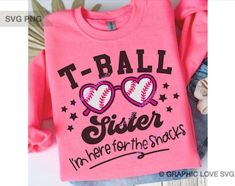 May include: Pink t-shirt with a black graphic that says "T-Ball Sister I'm here for the snacks" with a baseball-themed heart design.