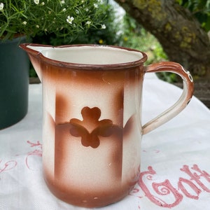 Old enamel jug