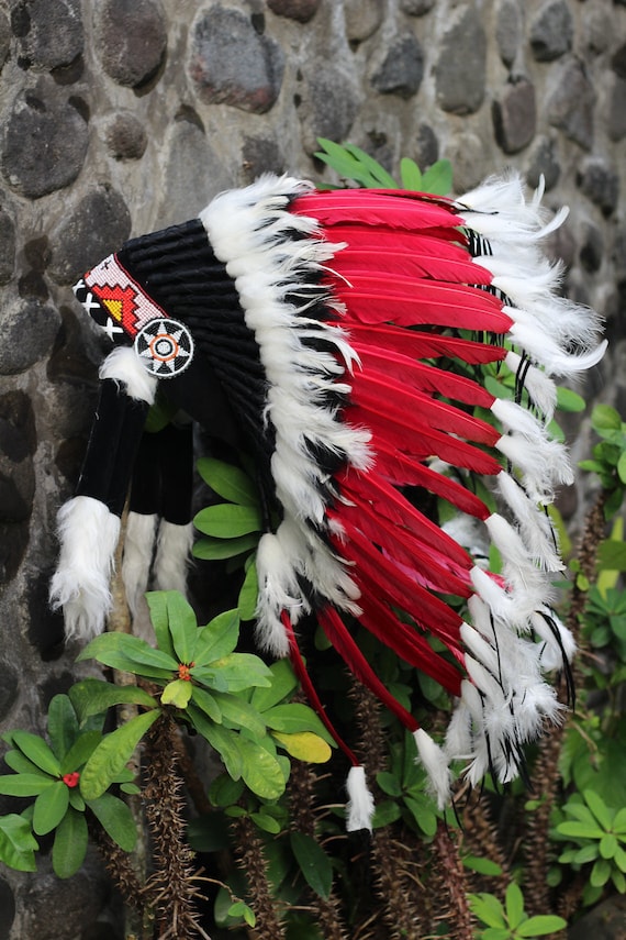 Short Orange Indian Headdress Replica made with Orange swan feathers and fabric band on the front