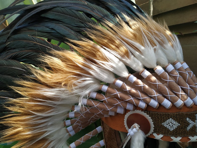Long Brown Indian Headdress Replica made with real rooster feathers and brown and white fur and gold beaded work in the front image 9