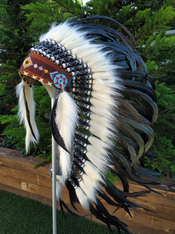 Short Orange Indian Headdress Replica made with Orange swan feathers and fabric band on the front